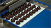 Desmodelador automático praline y tabletas de chocolate